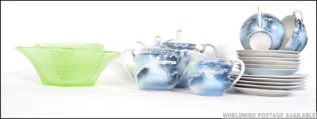 A 20th century par bone China Japanese Geisha girl tea service along with a vaseline glass dessert