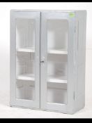 A 19th century Victorian shabby chic wall hanging medicine cabinet.