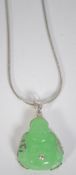 A silver and jade ladies buddha necklace.