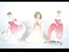A collection of Royal Doulton ceramic figurines to include Summers Day HN3378,
