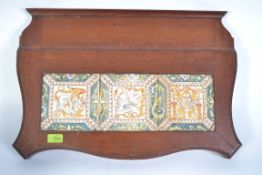 A Victorian 19th century mahogany and tiled Arts & Crafts stair shelf - butlers assistant.