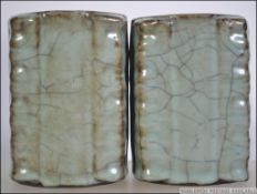 A pair of Chinese 20th century celadon crackle glaze pots / brush pots / vases. Measures 12cms high.