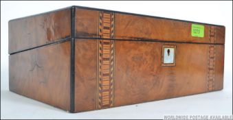 A 19th century tunbridgeware inlaid walnut writing slope having hinged centre with fully appointed