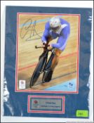 An official signed and mounted photograph of Sir Chris Hoy from the London Olympics before his