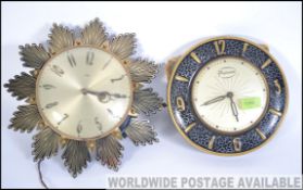 A retro 1950's Metamec sunburst wall clock together with a ceramic retro wall clock.