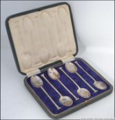 WITHDRAWN A cased set of six silver hallmarked Roman design teaspoons.
