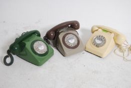 A collection of 3 retro 1950's vintage BT Ring dial telephones to include Grey,