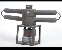 A vintage early 20th century large galvanised paraffin / petrol greenhouse heater.