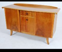 A 1930's Art Deco walnut sideboard in the manner of heals.