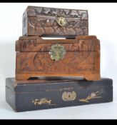 A collection of 3 Chinese wooden boxes to include 2 x carved mid century examples together with a