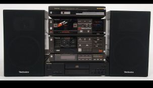 A fantastic 1980's Technics separates stacking system consisting of a Technics SL - J2 turntable