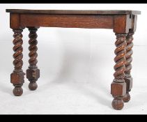 An Edwardian / early 20th century oak barley twist console hall table.
