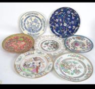 A mixed collection of Asiatic and Asiatic style plates to include Chinese and Meakin examples .