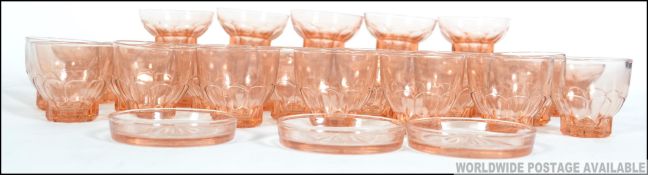 A good collection of vintage 20th century French peach glass sorbet dishes and glasses.
