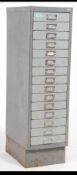 A Vintage Industrial 20th century metal filing cabinet Bisley style flight of ten narrow and