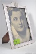 A silver hallmarked photograph frame of good size and shape being hallmarked for Robert Carr,