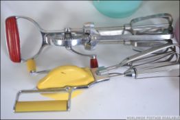 A collection of vintage retro tupperware to include many kitchen storage boxes in various colours.