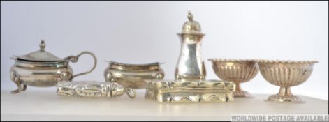 A collection of silver plated items to include a stunning match vesta with rococo decoration,