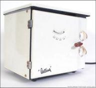 A vintage mid 20th century enamel table top Belling stove / oven.