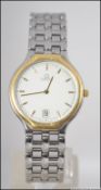 A gentlemans Omega 18ct gold bezel quartz wristwatch set on a stainless steel bracelet with baton