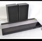 A retro 1970's Bang & Olufsen Beocenter 2200 complete with the original speakers.