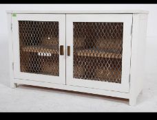 A 20th century shabby chic food cupboard - ideal as a bespoke pine entertainment unit / sideboard