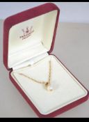 An 18ct gold Italian pendant necklace strung with a pearl drop pendant. Marked 750 * 3538 AL.