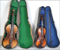 2 cased violins ,