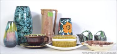 A collection of retro 1960's West German fat lava style pottery to include vases,
