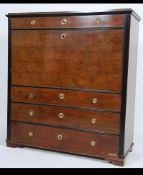 A 19th century continental mahogany abbatant - bureau writing desk of upright form having fall