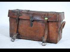 A vintage early 20th century military leather mule chest / ammunition chest.