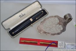 A boxed Scripto Lady ball pen complete with original tassle along with a retro vintage boxed Parker