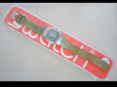 A vintage Swatch Watch RipCurl OceanTec2Thousand water resistant surf watch complete in original