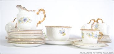 A stunning hand painted 19th century bone China Victorian tea set beautifully painted with blue and