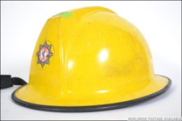 A 20th century County of Avon Fire Brigade helmet made by Churchill.
