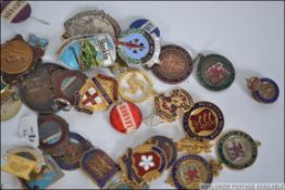 A good collection of vintage enamel badges, pin badges etc to include clubs, prefect badges,