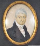 An early 19th Century miniature portrait of a Dutch gentleman in formal attire of the age .