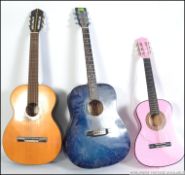 A group of three Spanish style six string acoustic guitars to include Encore and a three quarter