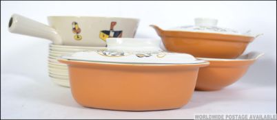 A set of retro Petrus Regouta + Co Maastrich MI Holland plates together with a serving dish along