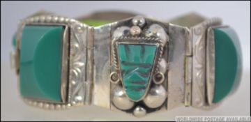 A silver stamped 925 Sterling six sectional panel bracelet.