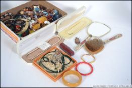A collection of costume jewellery to include bracelets, bangles, bead necklaces,