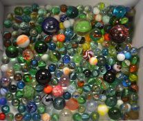 A good collection of marbles to include believed 19th century examples, coloured glass, spiral,
