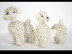 A pair of Original mid century 1950's mid century Italian vintage spaghetti poodle figurines.
