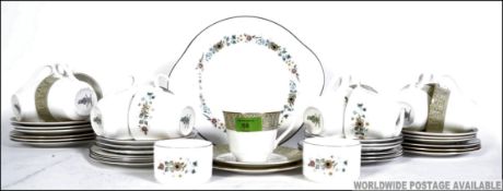 Two Royal Doulton tea sets in English Fine Bone China: ' Sonnet H5012 ' six trios and ' Pastorale