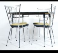 A retro 1970's Italian chrome and faux wood kitchenette - diner dining table complete with the 4