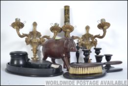 A vintage 20th century Ebony dressing table set consisting of candle sticks, pots, ring stand,
