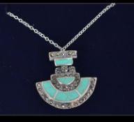 A silver and enamel Art Deco style pendant necklace on a silver chain. Weight 6.