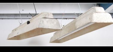 A pair of 1950's vintage industrial factory enamel strip lights.