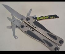 A 20th century American Gerber multi tool complete in the original canvas belt protective case