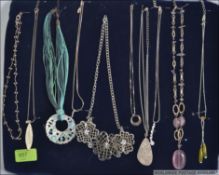 A good group of 10 costume jewellery necklaces to include silver 925 examples all mounted on a